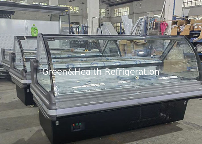 Dentro le specialità gastronomiche di acciaio inossidabile la ghiottoneria visualizza il refrigeratore per il raffreddamento del fan del negozio