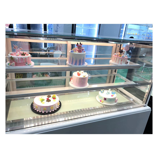 Negozio di torte in vetro trasparente a più strati, utilizza un serbatoio per il deposito e un congelatore.