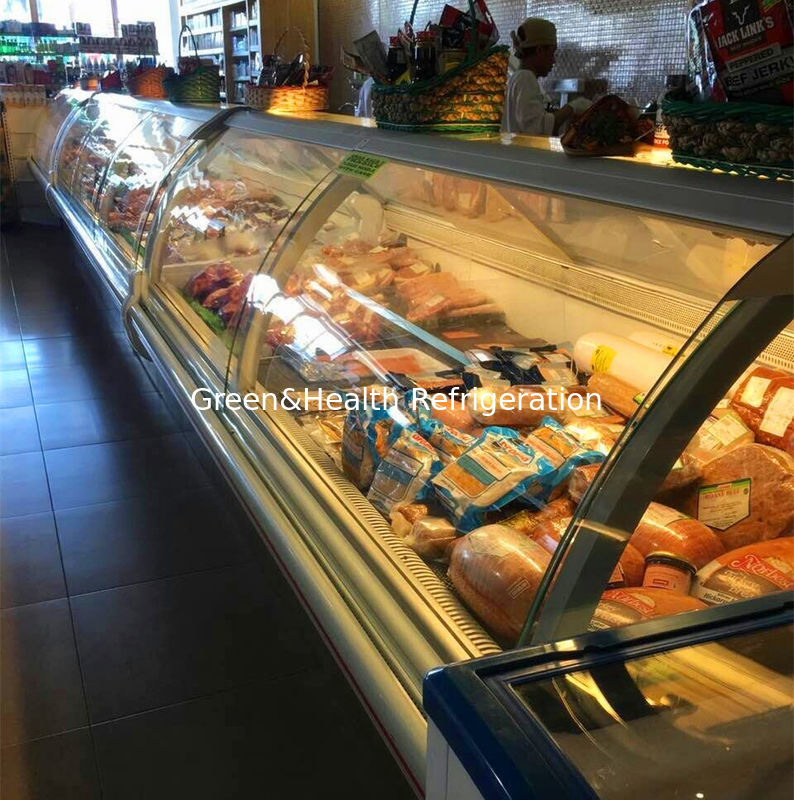 Vetrina commerciale per carne con interno in vetro curvo in acciaio inossidabile e sistema di raffreddamento a ventola